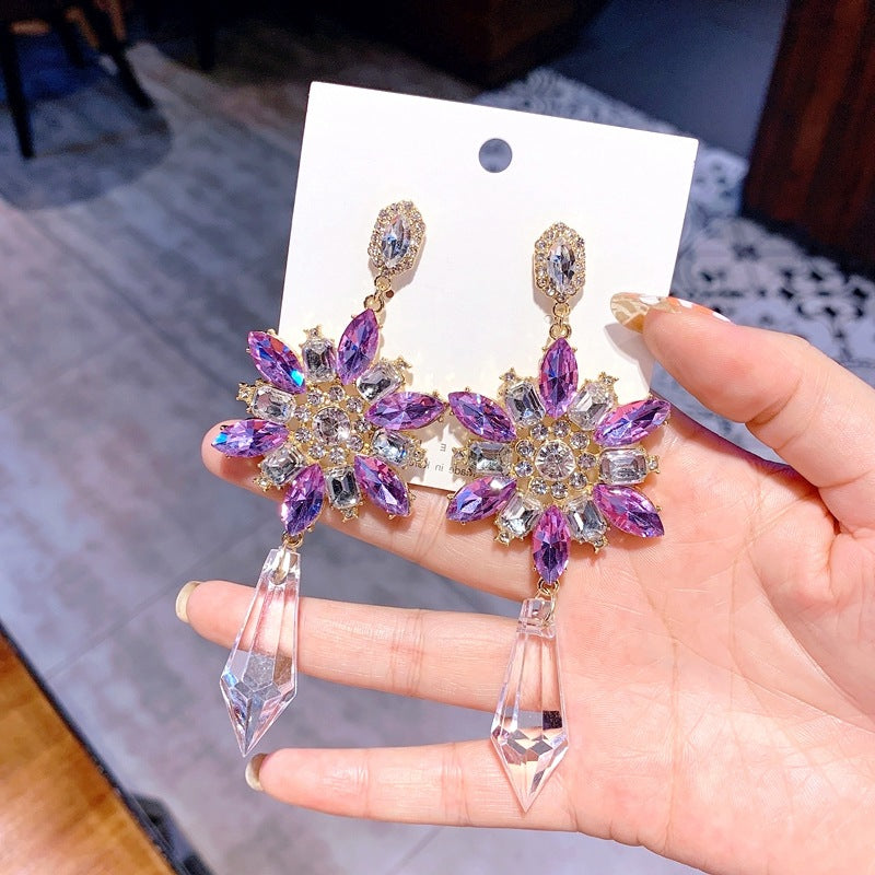 Purple Soft-Glow Flower Earrings — product photo 1 | Organic Truth