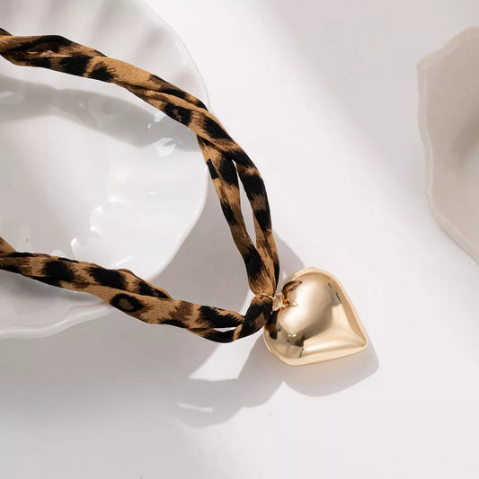 Leopard Print Choker with Golden Heart Pendant Necklace — product photo 2 | Organic Truth