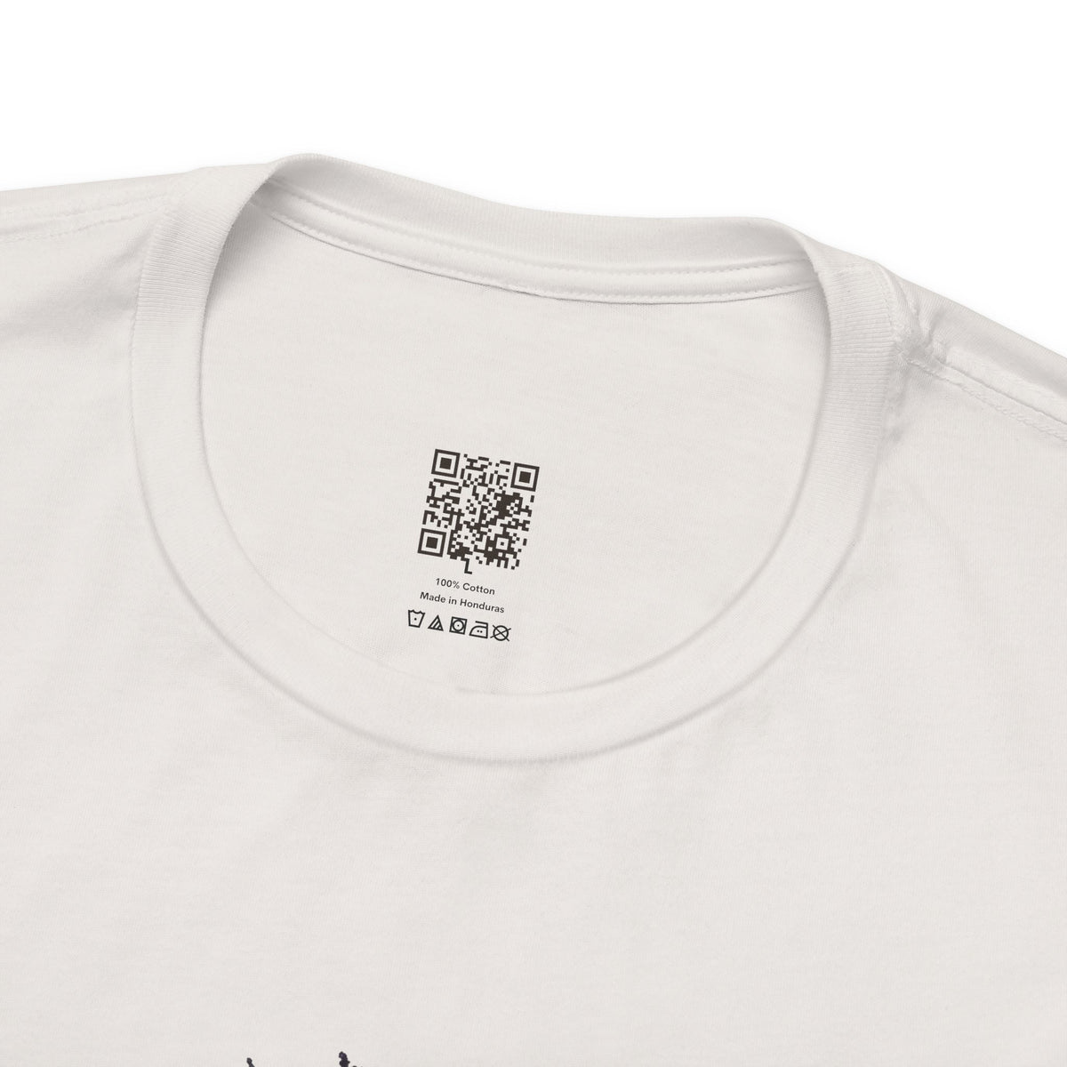 Dragon Eye graphic tee in vintage white, collar close-up: printed Organic Truth QR neck label