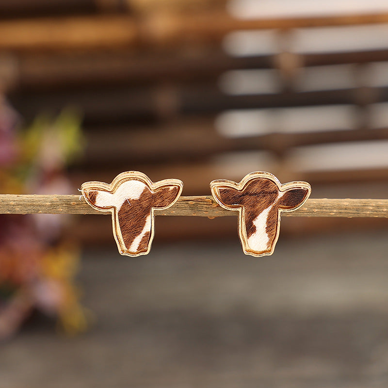 Cow head earrings – detail view 1