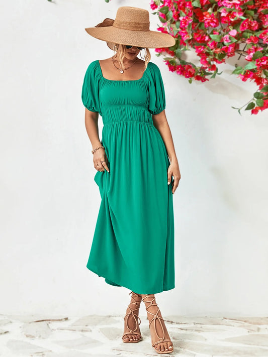 Off-shoulder puff-sleeve smocked maxi dress — view 1 | Organic Truth
