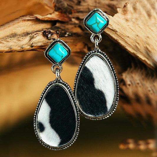 Cow print earrings: Cow Print Teardrop Earrings with Blue-Green Glow Accent
