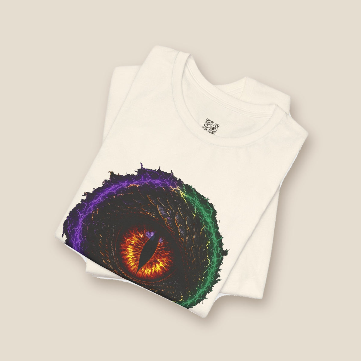 Dragon Eye graphic tee in natural, folded: fire-lit dragon eye front